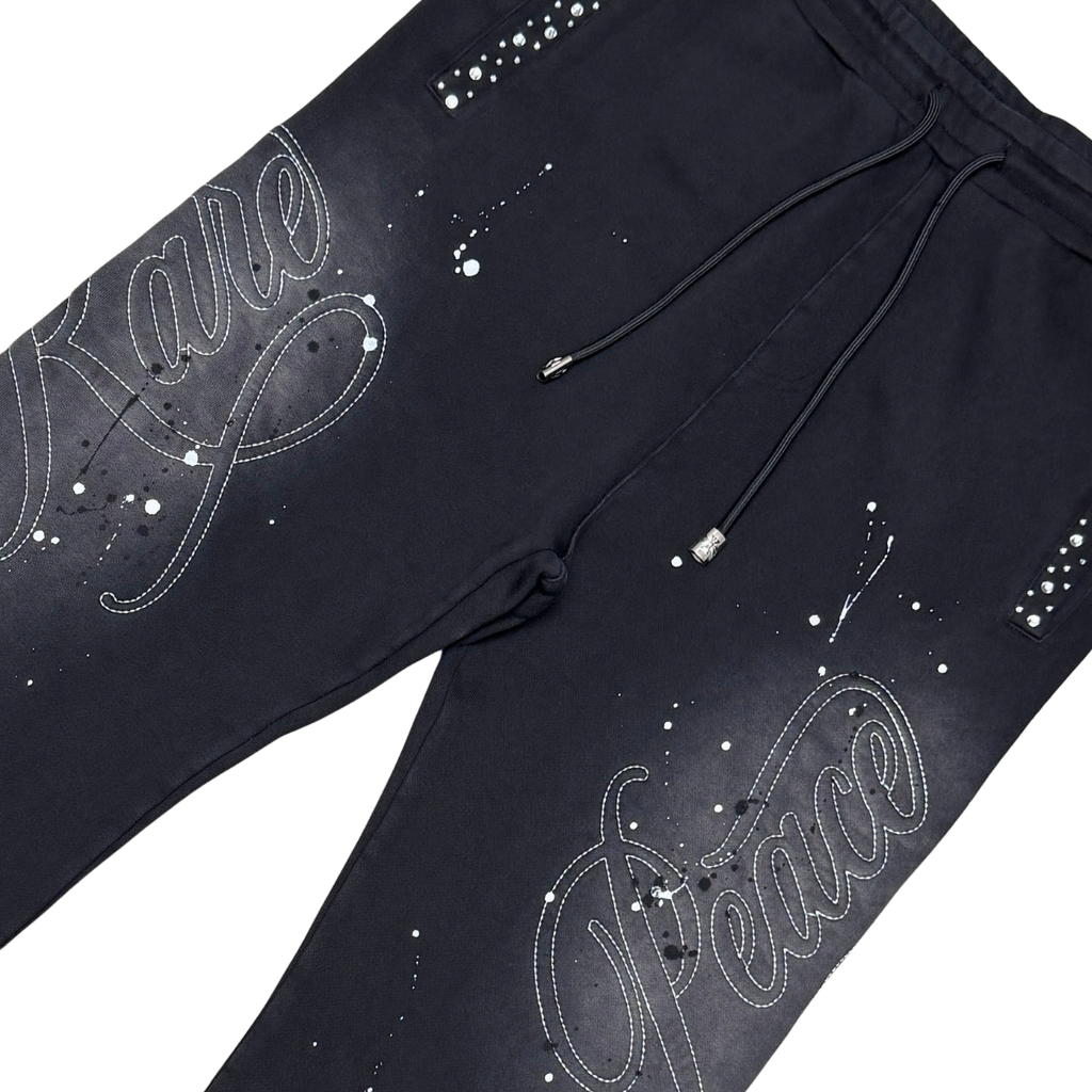 WASHED RHINESTONE SPLATTER JOGGER BLACK - front rhinestone detail flat lay on white