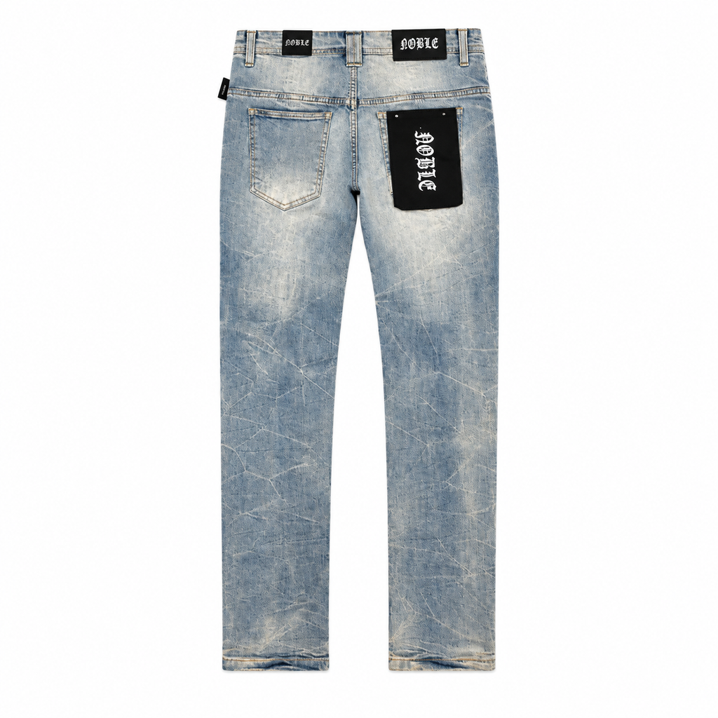 Noble essential ripped jeans in vintage blue, back flat lay with ripped knees | ICON Clothing